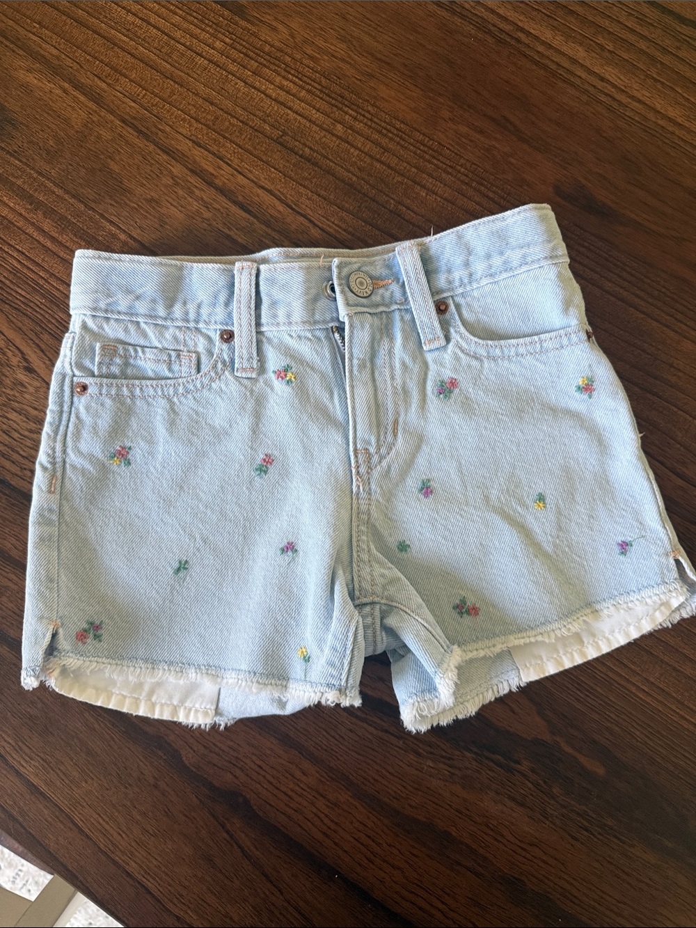 Girls Size 6 Old Navy Light Blue Denim Shorts with flowers. Worn once